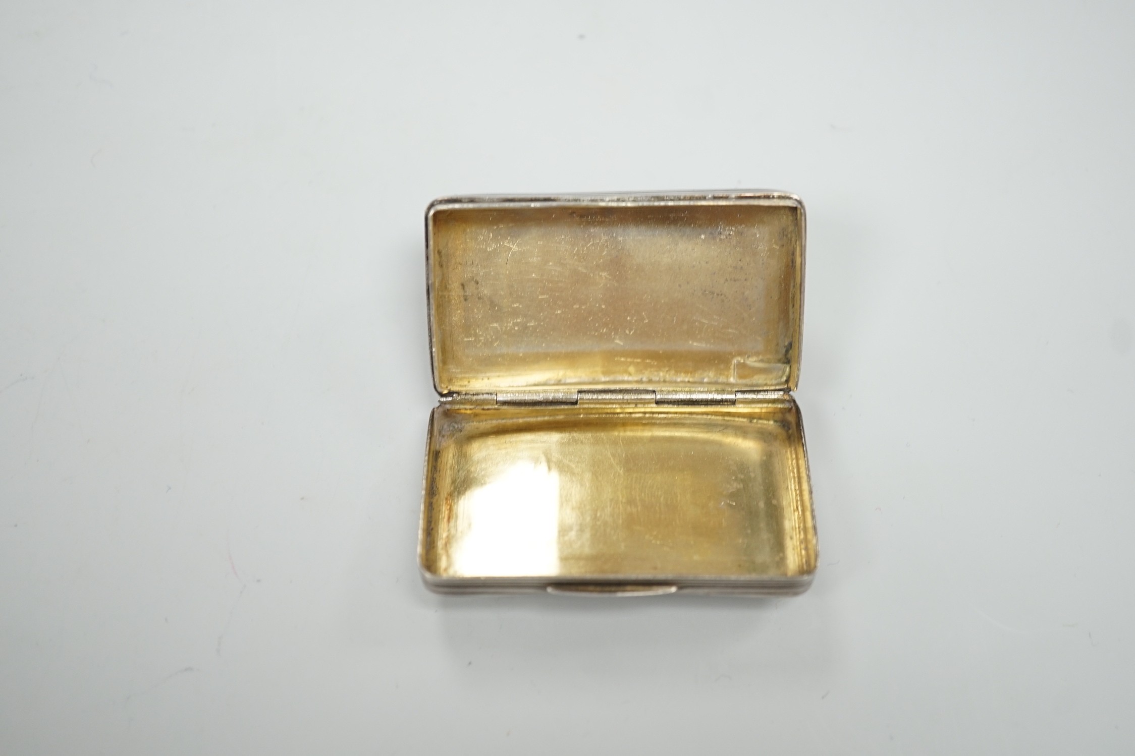 A George III ribbed silver snuff box, maker ?S, Birmingham, 1810, 58mm.